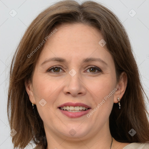 Joyful white adult female with medium  brown hair and grey eyes