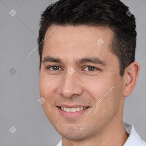 Joyful white young-adult male with short  brown hair and brown eyes