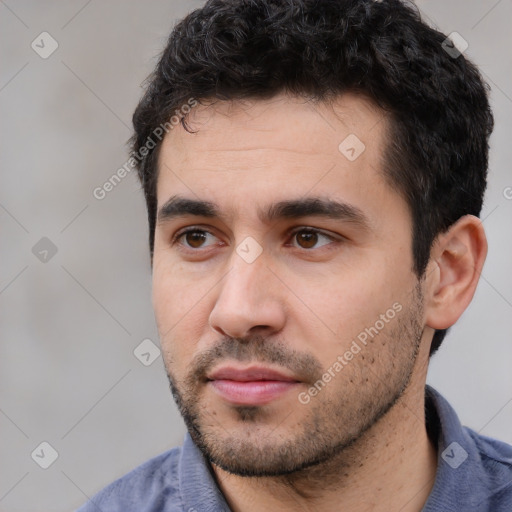 Neutral white young-adult male with short  black hair and brown eyes