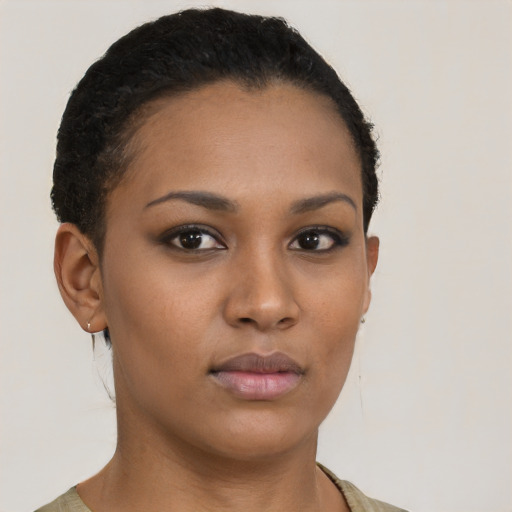 Neutral latino young-adult female with short  brown hair and brown eyes