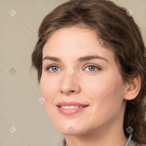 Joyful white young-adult female with medium  brown hair and green eyes