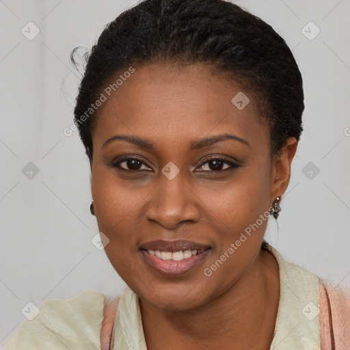 Joyful black young-adult female with short  brown hair and brown eyes