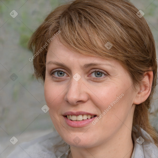 Joyful white young-adult female with medium  brown hair and blue eyes