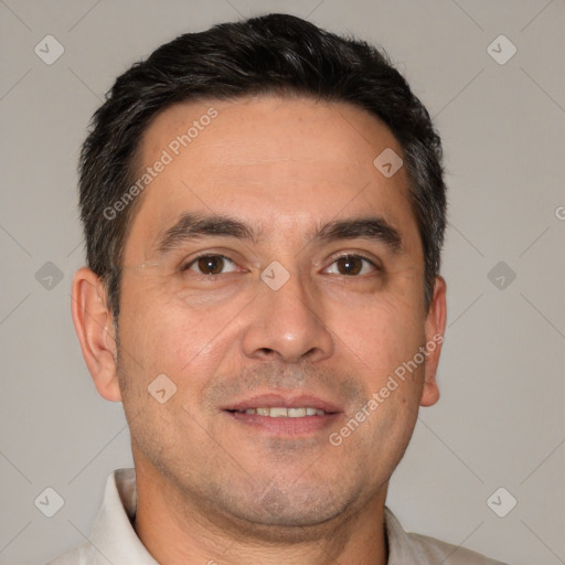 Joyful white adult male with short  brown hair and brown eyes