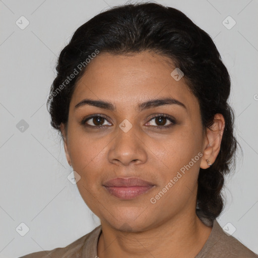 Joyful latino young-adult female with medium  black hair and brown eyes