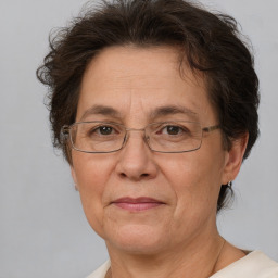 Joyful white middle-aged female with short  brown hair and brown eyes