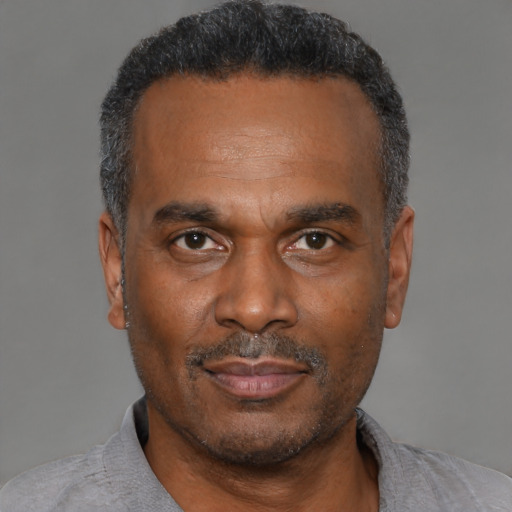 Neutral black adult male with short  black hair and brown eyes