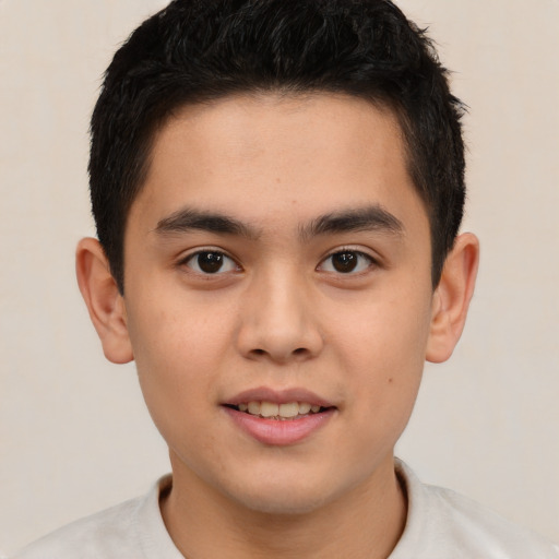 Joyful latino young-adult male with short  brown hair and brown eyes