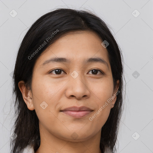 Joyful latino young-adult female with medium  brown hair and brown eyes