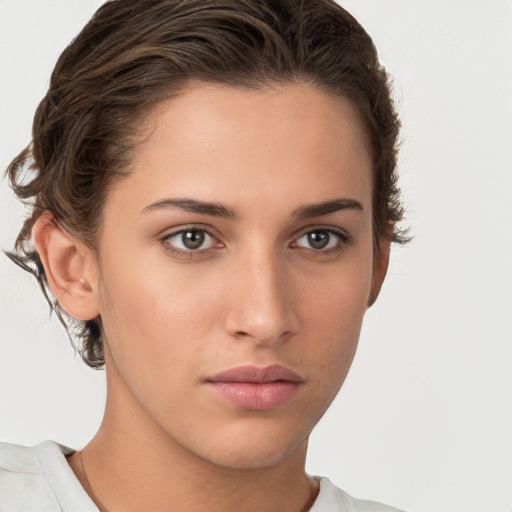 Neutral white young-adult female with short  brown hair and brown eyes