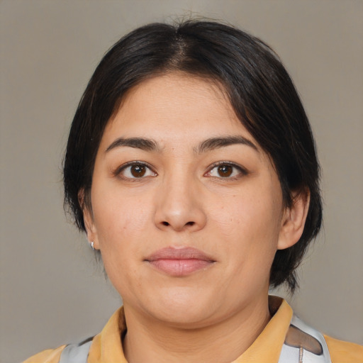 Neutral latino young-adult female with medium  brown hair and brown eyes