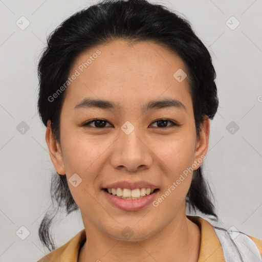 Joyful asian young-adult female with medium  black hair and brown eyes