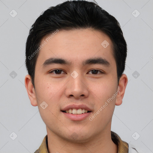 Joyful white young-adult male with short  black hair and brown eyes