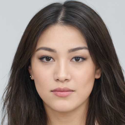 Neutral asian young-adult female with long  brown hair and brown eyes