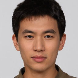 Neutral asian young-adult male with short  brown hair and brown eyes