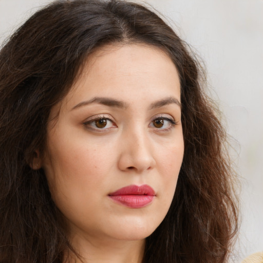 Neutral white young-adult female with long  brown hair and brown eyes