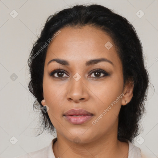 Joyful latino young-adult female with medium  black hair and brown eyes