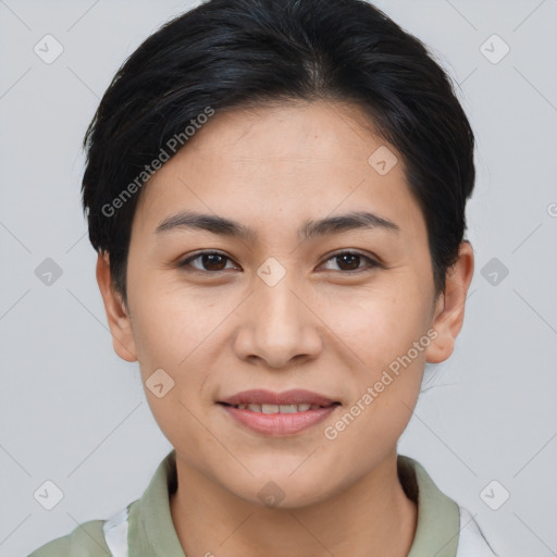 Joyful asian young-adult female with short  brown hair and brown eyes