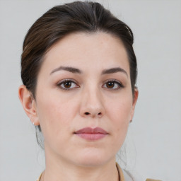 Neutral white young-adult female with short  brown hair and brown eyes