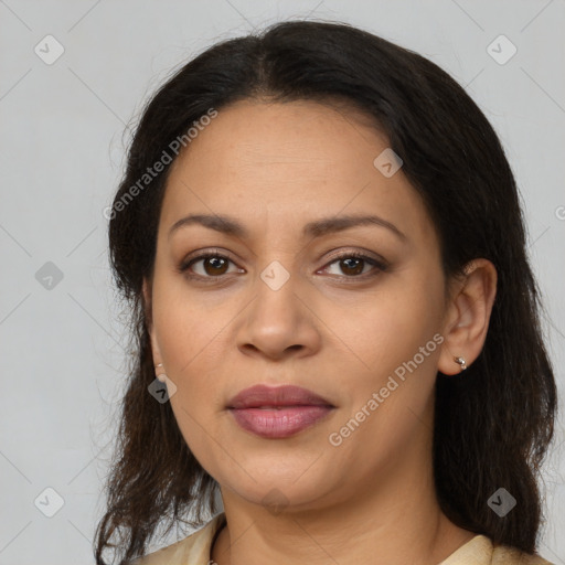Joyful latino young-adult female with medium  brown hair and brown eyes