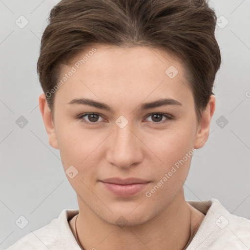 Joyful white young-adult female with short  brown hair and grey eyes