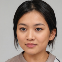 Neutral asian young-adult female with medium  black hair and brown eyes