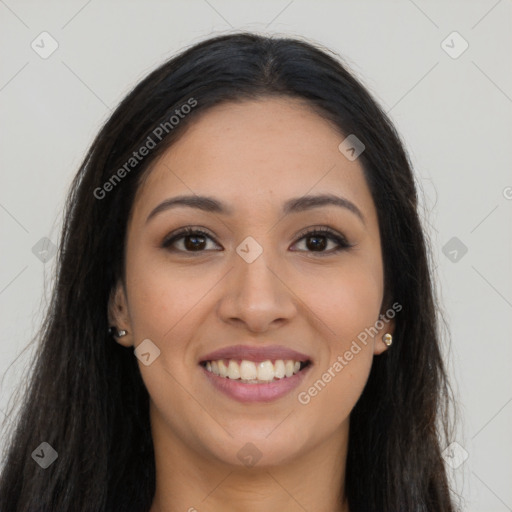 Joyful latino young-adult female with long  brown hair and brown eyes