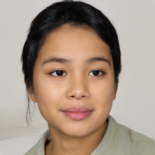 Joyful asian young-adult female with medium  black hair and brown eyes