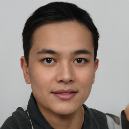 Neutral asian young-adult male with short  brown hair and brown eyes