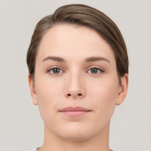 Neutral white young-adult female with short  brown hair and brown eyes