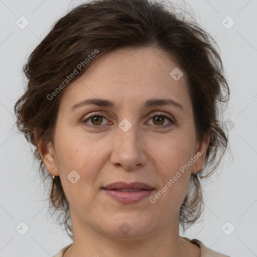 Joyful white adult female with short  brown hair and brown eyes