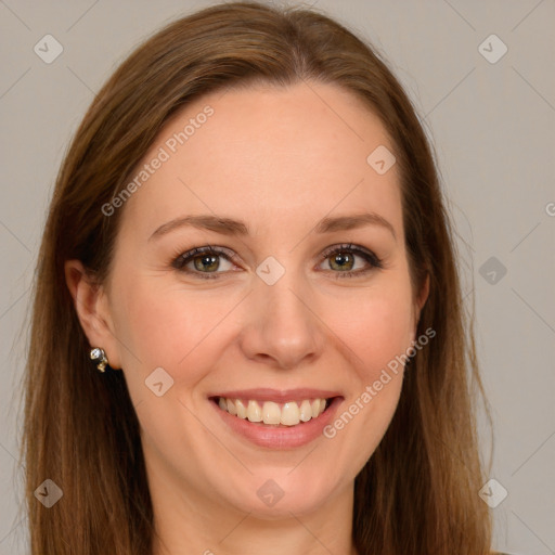 Joyful white young-adult female with long  brown hair and green eyes