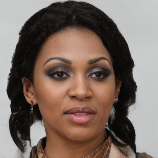 Joyful black young-adult female with medium  black hair and brown eyes