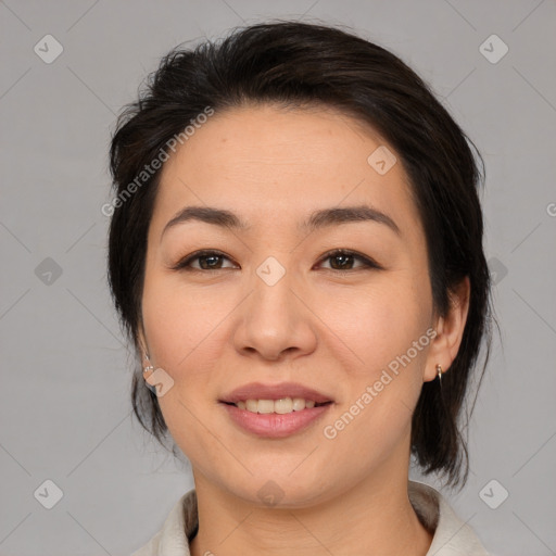 Joyful asian young-adult female with medium  brown hair and brown eyes