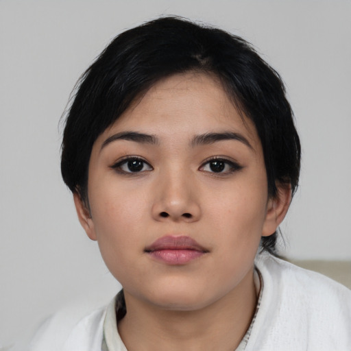 Neutral asian young-adult female with short  black hair and brown eyes