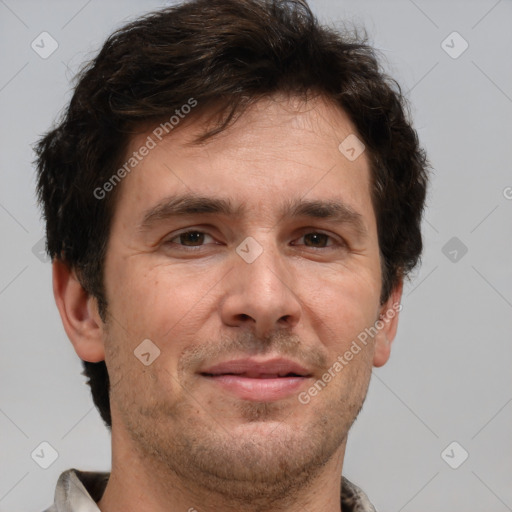 Joyful white adult male with short  brown hair and grey eyes