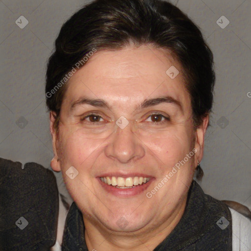 Joyful white adult female with short  brown hair and brown eyes