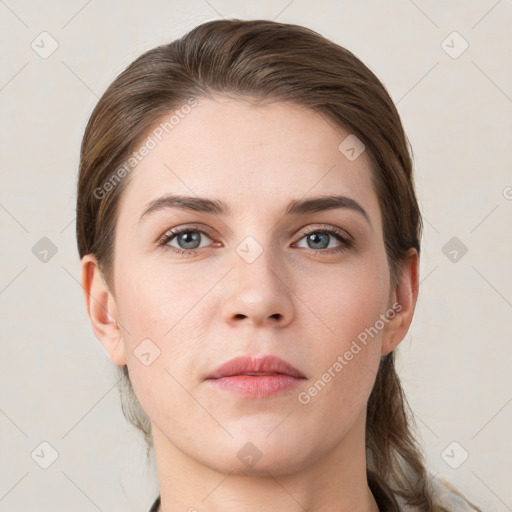 Neutral white young-adult female with short  brown hair and grey eyes