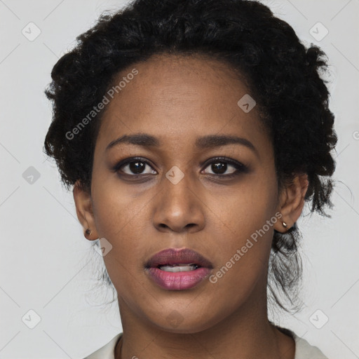 Neutral black young-adult female with short  black hair and brown eyes