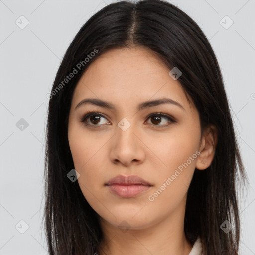 Neutral latino young-adult female with long  brown hair and brown eyes