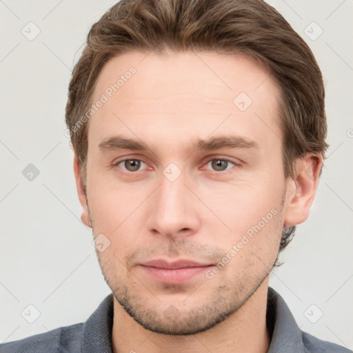 Neutral white young-adult male with short  brown hair and grey eyes