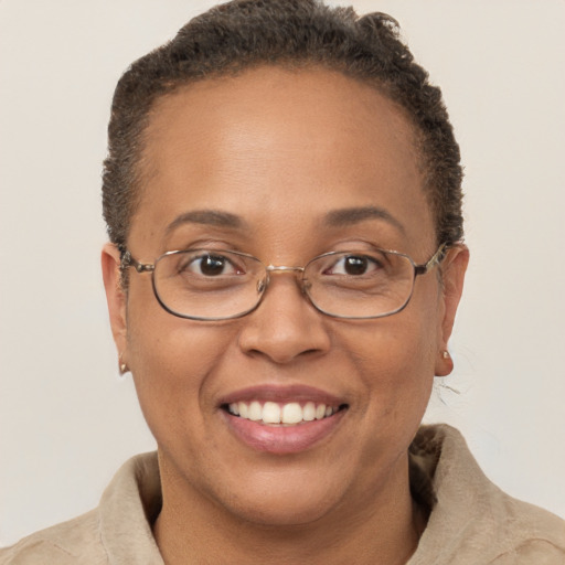 Joyful white adult female with short  brown hair and brown eyes