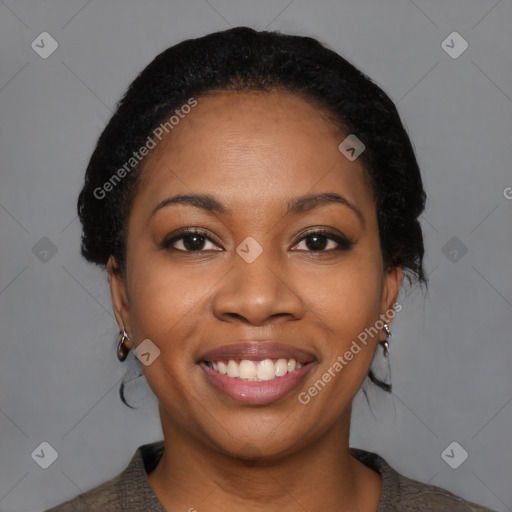 Joyful black young-adult female with medium  black hair and brown eyes