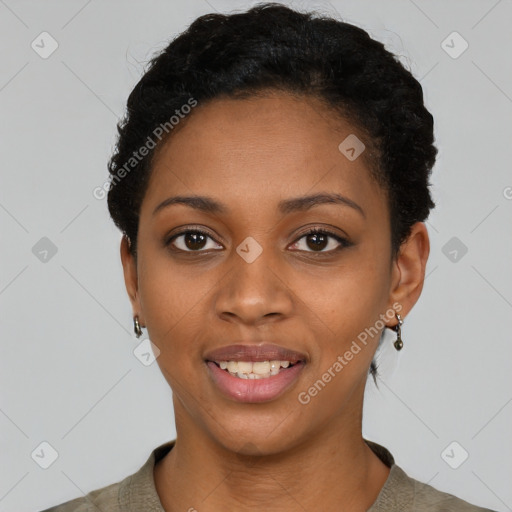 Joyful black young-adult female with short  black hair and brown eyes