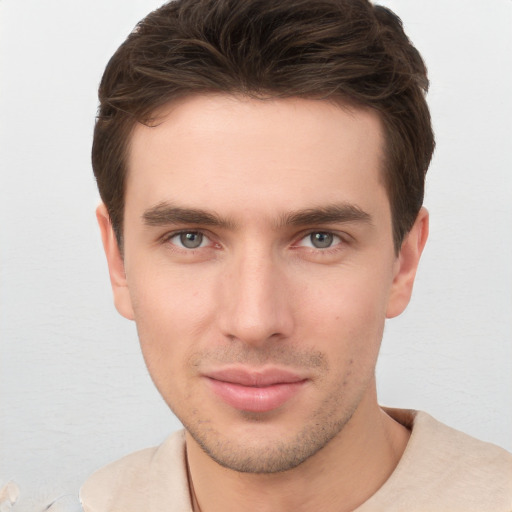 Neutral white young-adult male with short  brown hair and brown eyes