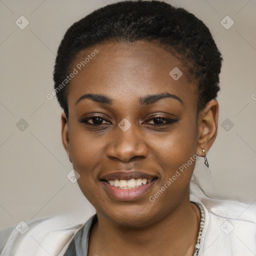 Joyful black young-adult female with short  black hair and brown eyes