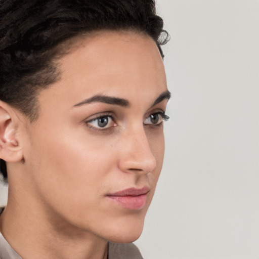 Neutral white young-adult female with short  brown hair and brown eyes