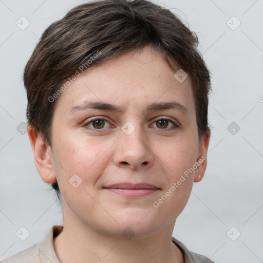 Joyful white young-adult female with short  brown hair and grey eyes