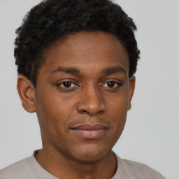 Neutral black young-adult male with short  brown hair and brown eyes