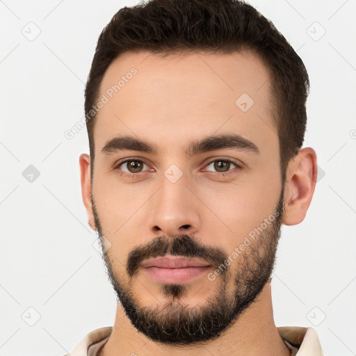 Neutral white young-adult male with short  brown hair and brown eyes